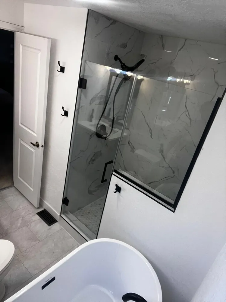 Modern bathroom remodel with marble tile shower in Boise, ID