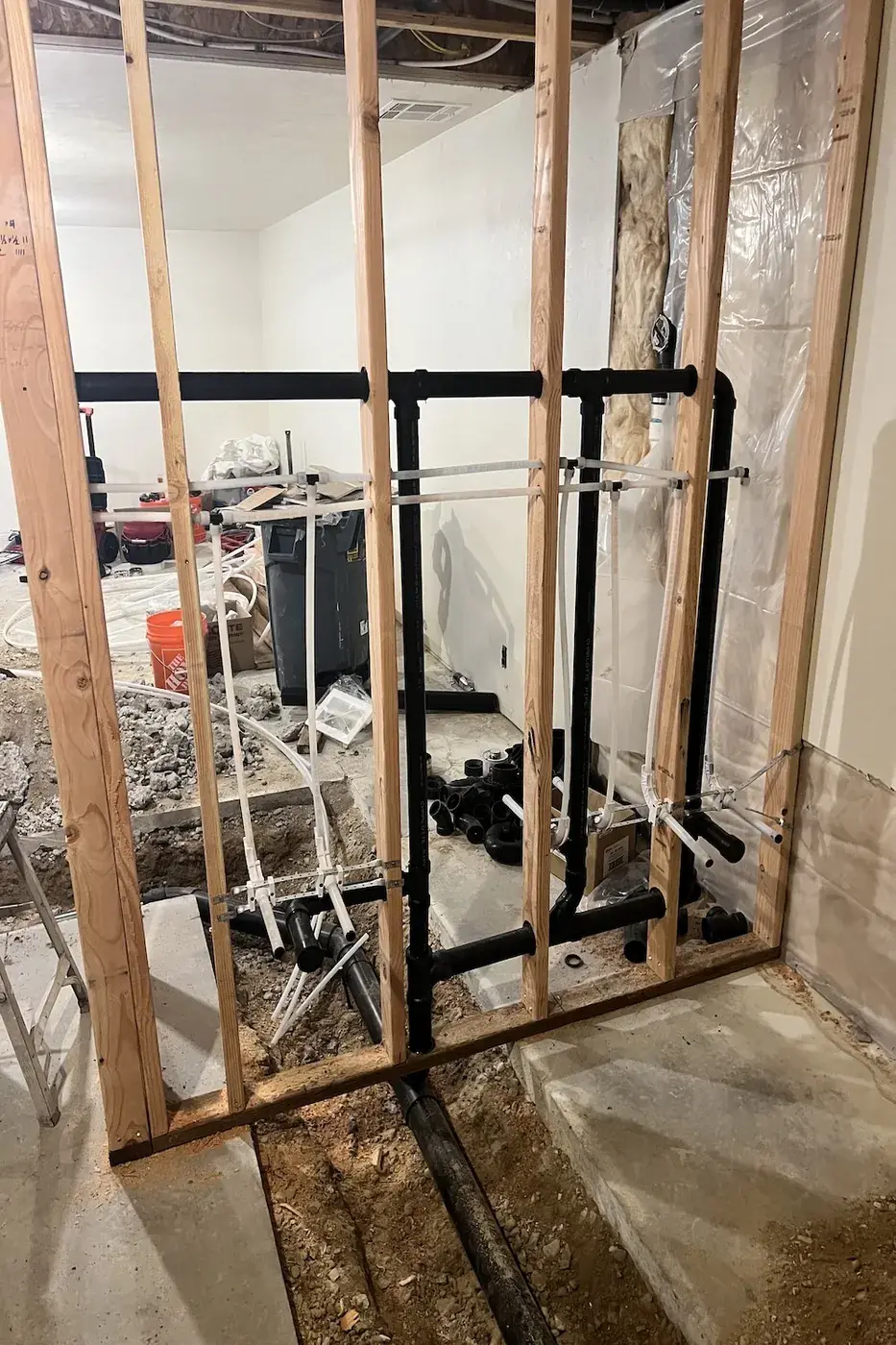 Rough-in plumbing for a basement bathroom addition in Boise