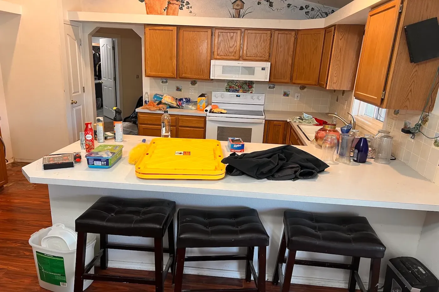 Outdated Boise kitchen before remodel with oak cabinets and worn countertops