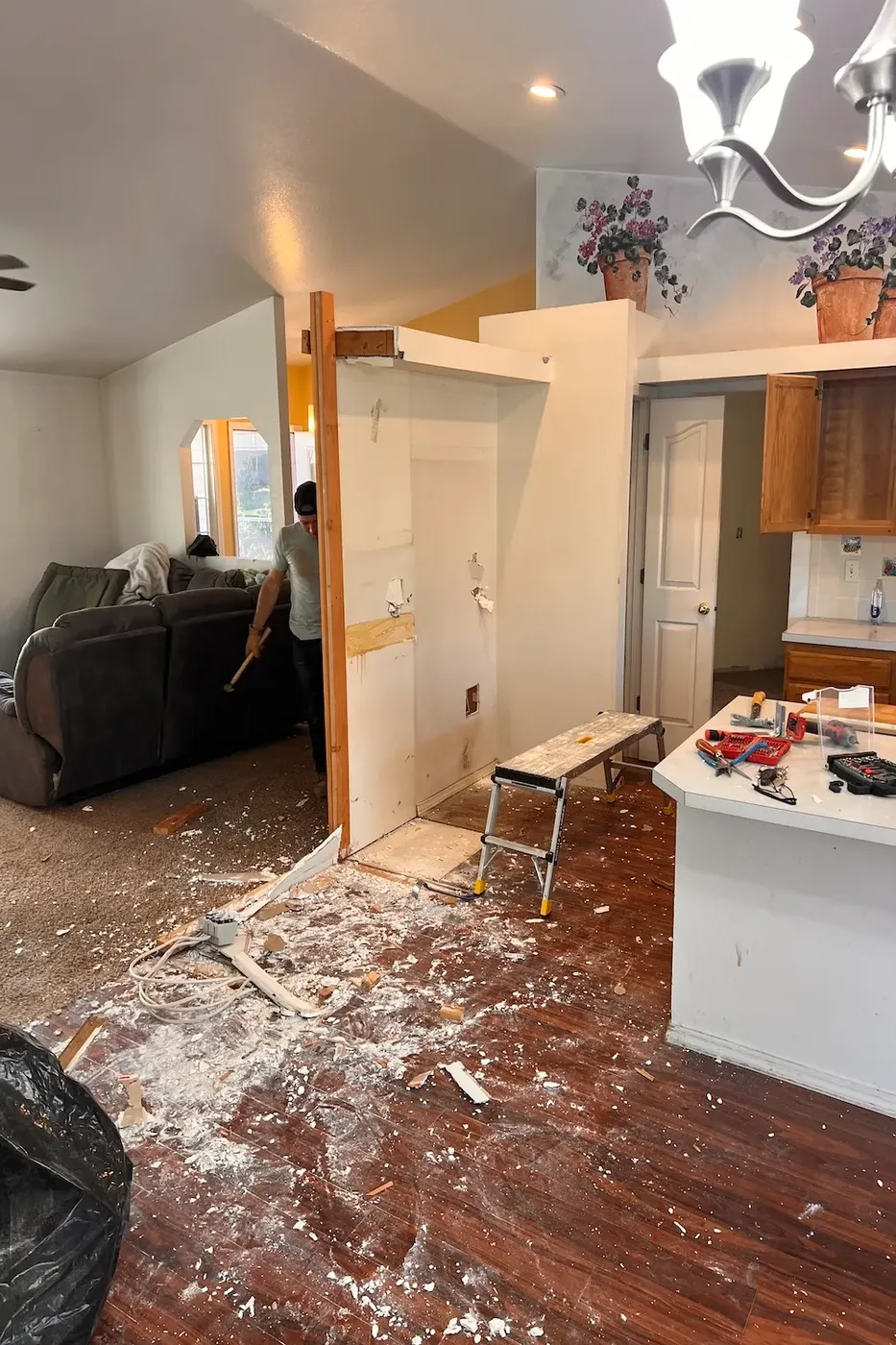 Removing a non-structural wall to open the kitchen floor plan in Boise