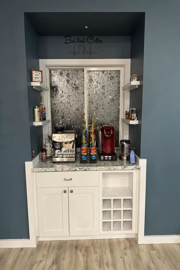 Custom built-in coffee station with cabinetry and shelving